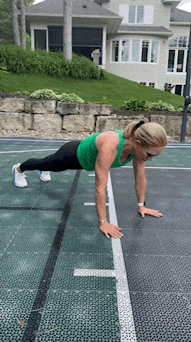 woman showing plank hold exercise